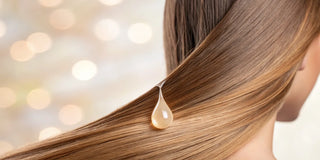 Best smoothing cream applied to shiny hair for frizz control and a silky finish.
